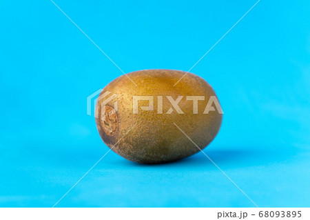 Image of ripe fresh kiwi on blue background 68093895