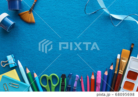Stationery set on blue background. School supplies Stationery set on blue background. School supplies 68095698