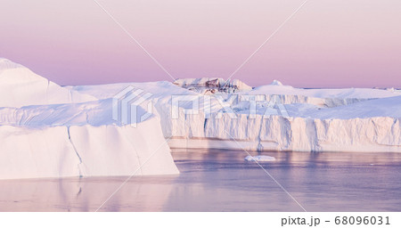Climate Change - Iceberg and ice from glacier in arctic nature on Greenland Climate Change - Iceberg and ice from glacier in arctic nature on Greenland 68096031