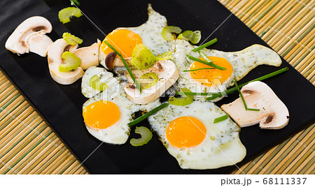 Broken quail eggs with champignons Broken quail eggs with champignons 68111337