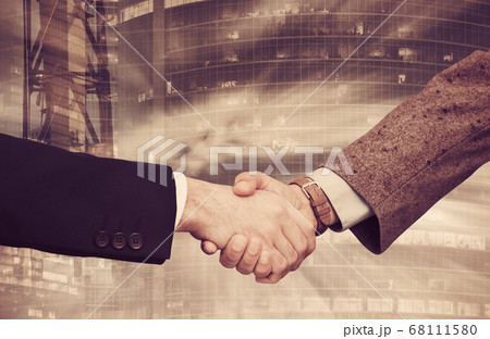 Handshake on background with industrial landscape 68111580