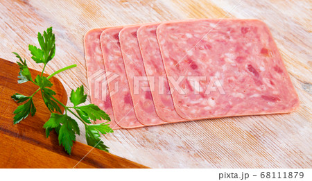 Closeup of sliced tasty ham on plate Closeup of sliced tasty ham on plate 68111879
