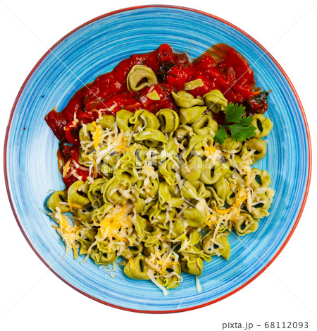 Green tortellini with baked red sweet pepper in tomato sauce 68112093