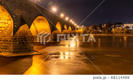 Baldwin Bridge, German: Balduinbrucke. Medieval stone bridge in Koblenz by night, Germany 68114406