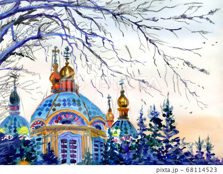 Church at sunset. Turquoise blue bathed the cathedral in the spring cold sky against the background of tree branches 68114523