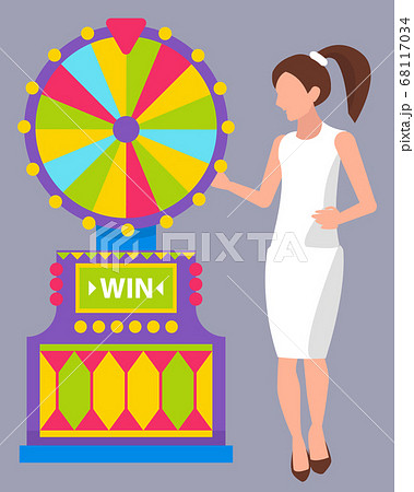 Girl Wearing White Dress Spinning Roulette Wheel 68117034