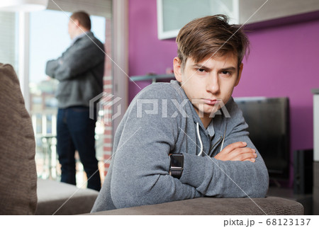 Teenager son quarreled with her father Teenager son quarreled with her father 68123137