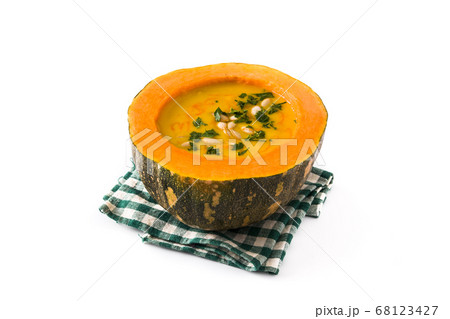 Pumpkin and carrot soup isolated on white background. Autumn food. 68123427