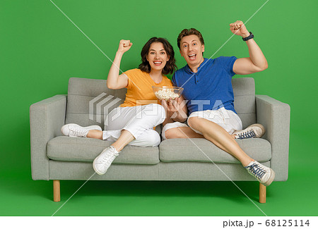 Happy couple on bright color background. Happy couple on bright color background. 68125114
