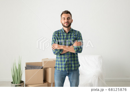 Handsome man in new flat Handsome man in new flat 68125876