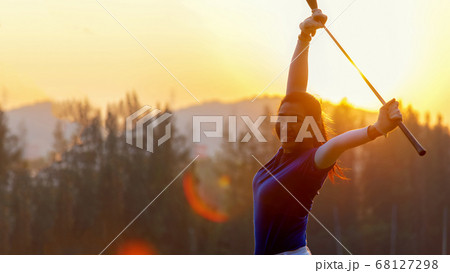 Golfer woman cheerful happy and relax with a golf Golfer woman cheerful happy and relax with a golf 68127298