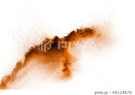 Brown dust exploding cloud.Brown particles splattered on white background. Brown dust exploding cloud.Brown particles splattered on white background. 68128870
