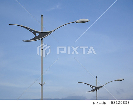 Street lighting during daytime. Purpose to provide light at night to the roads or building compound.  68129833