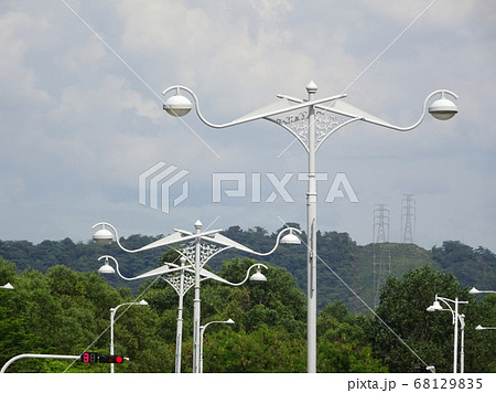 Street lighting during daytime. Purpose to provide light at night to the roads or building compound.  68129835