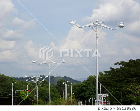 Street lighting during daytime. Purpose to provide light at night to the roads or building compound.  68129836