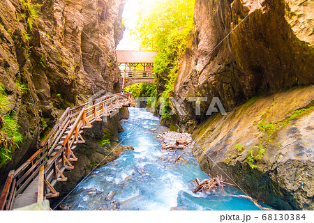 Sigmund Thun Gorge. Cascade valley of wild Kapruner Ache near Kaprun, Austria Sigmund Thun Gorge. Cascade valley of wild Kapruner Ache near Kaprun, Austria 68130384