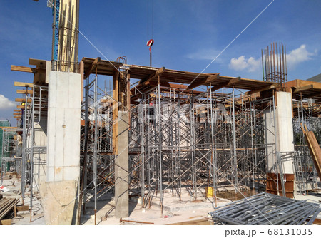 KUALA LUMPUR, MALAYSIA -NOVEMBER 11, 2016: Metal scaffolding used as temporary structure to support slab timber form work at the construction site. Able to adjust to get required level.    68131035