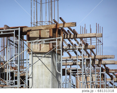 KUALA LUMPUR, MALAYSIA -DECEMBER 16, 2017: Reinforcement concrete column under construction at the construction site. Fabricated and constructed by workers. KUALA LUMPUR, MALAYSIA -DECEMBER 16, 2017: Reinforcement concrete column under construction at the construction site. Fabricated and constructed by workers. 68131318