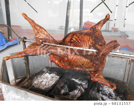 PUTRAJAYA, MALAYSIA -DECEMBER 30, 2016: Grilled lamb provided by the street hawkers to the customer. PUTRAJAYA, MALAYSIA -DECEMBER 30, 2016: Grilled lamb provided by the street hawkers to the customer. 68131557
