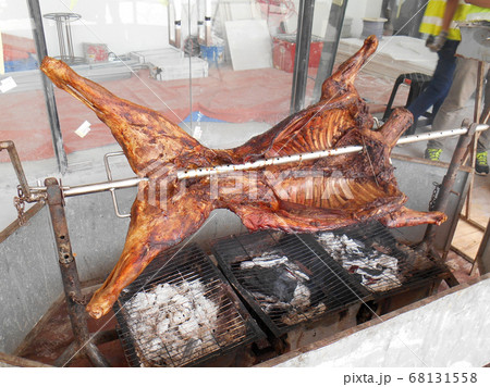 PUTRAJAYA, MALAYSIA -DECEMBER 30, 2016: Grilled lamb provided by the street hawkers to the customer. PUTRAJAYA, MALAYSIA -DECEMBER 30, 2016: Grilled lamb provided by the street hawkers to the customer. 68131558
