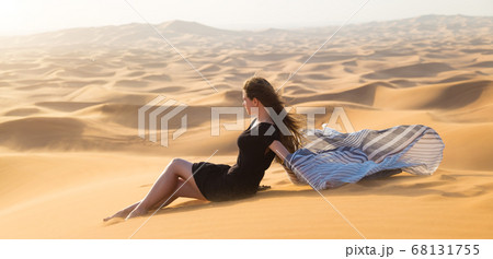 A cute caucasian girl is resting in the sun. 68131755