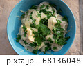 Homemade dumplings, traditional dumplings with meat, greens and cheese 68136048