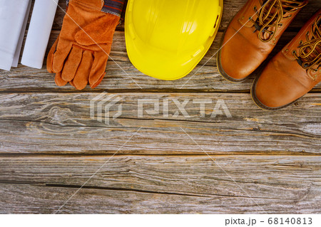 Industry worker architect with blueprints in the 68140813