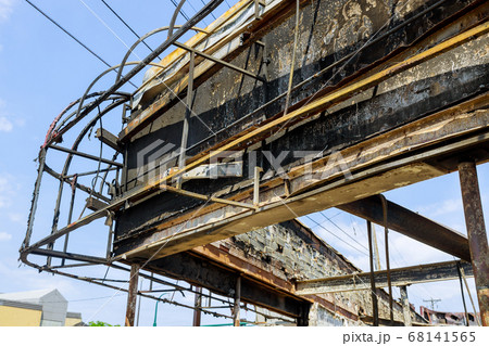 Panoramic view of a place looted and burned by 68141565