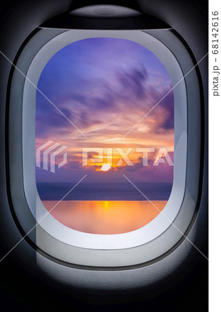 .Beautiful sunset in seascape from aircraft window 68142616