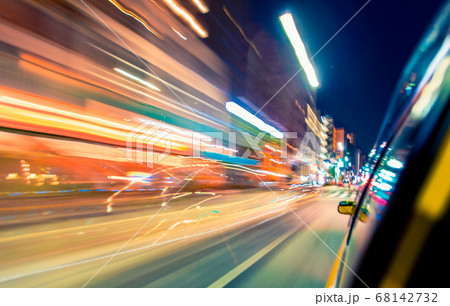 Motion blurred drive through the city 68142732