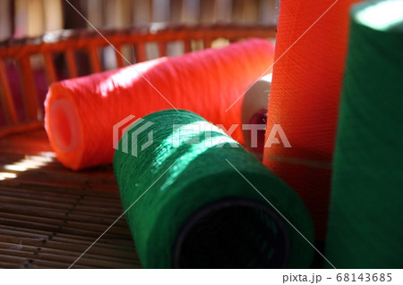 close up green yarn on spool.lighting and shadow close up green yarn on spool.lighting and shadow 68143685