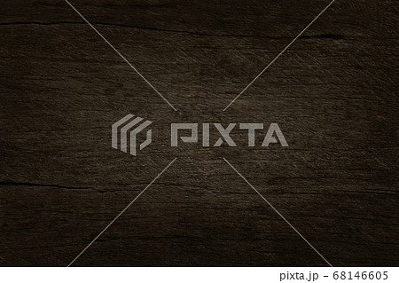 Dark brown wooden wall background, texture of bark wood with old natural pattern for design art work, top view of grain timber. Dark brown wooden wall background, texture of bark wood with old natural pattern for design art work, top view of grain timber. 68146605