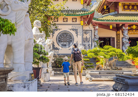 Dad and son tourists in Chua Linh Ung Bai But Temple, Lady Buddha Temple in Da Nang, Vietnam. Traveling with children concept 68152434