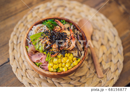 Poke bowl with shrimp, corn, avocado, ginger and mushrooms 68156877