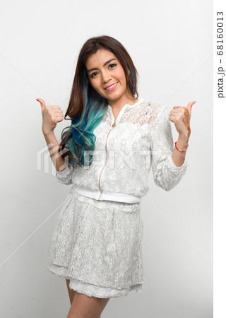 Portrait of young beautiful Asian woman with dyed hair 68160013