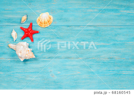 red starfish and sea shells over wooden rustic 68160545