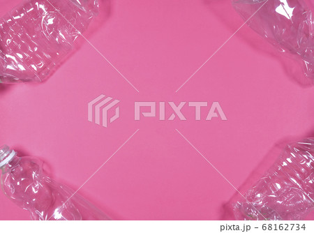 Plastic bottles isolated on pink background. Plastic bottles isolated on pink background. 68162734