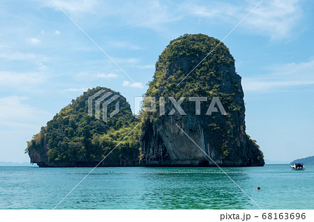 Mountainous and wooded island off Ao Phra Nang Beach, near Ao Nang in southern Thailand.	 68163696