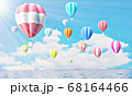 Colorful hot air balloons rising above serene the ocean  68164466