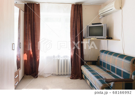 Interior of a budget room in an old hotel Interior of a budget room in an old hotel 68166992