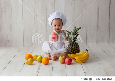 One year old baby. Little chef. 68168368