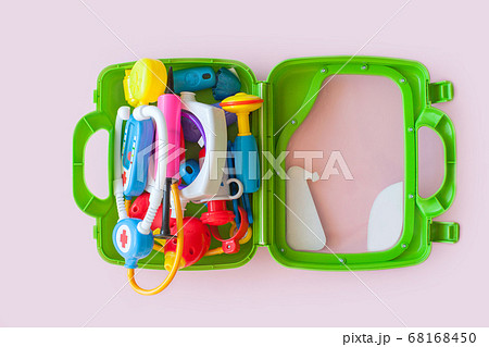Doctor's suitcase on a pink background. Medical tools.  68168450
