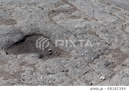 asphalt damaged road 68182384