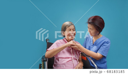 elderly woman happiness talking with caregiver 68183185