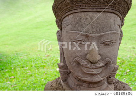 Spider on statue face at Angkor wat ,  Angkor Thom temple in Siem Reap city , Cambodia. Popular famous tourist attraction in Cambodia 68189306