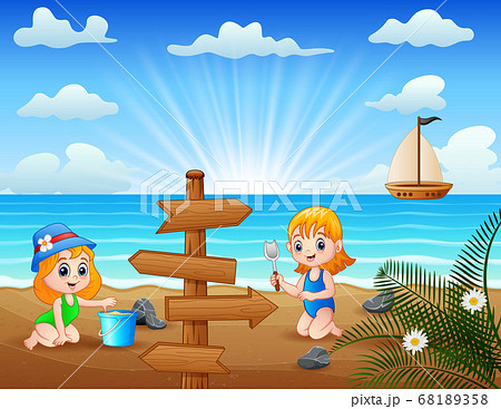 Happy little girls playing sea sand Happy little girls playing sea sand 68189358