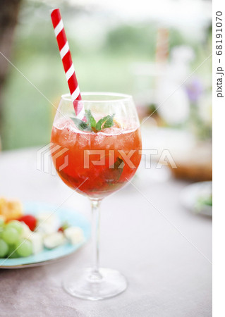 Goblet of alcohol cocktail mojito with mint and 68191070