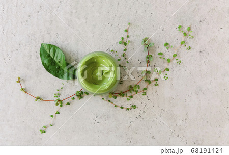 Clay mask in jar on table 68191424