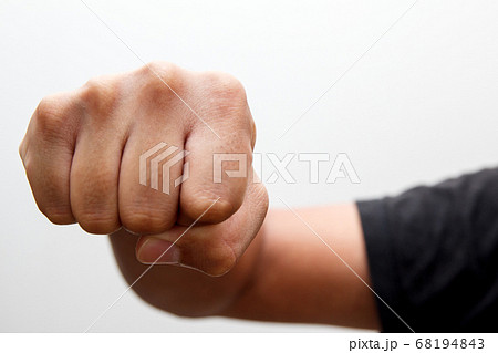 パンチ 握りこぶしの写真素材