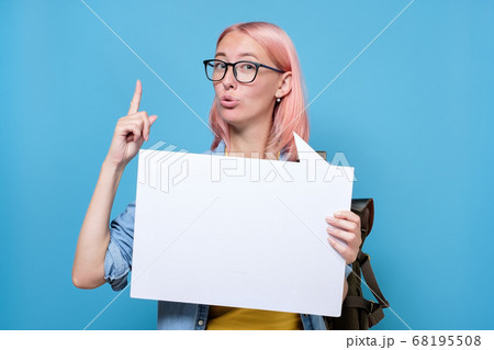 Woman showing sign speech bubble banner pointing up 68195508
